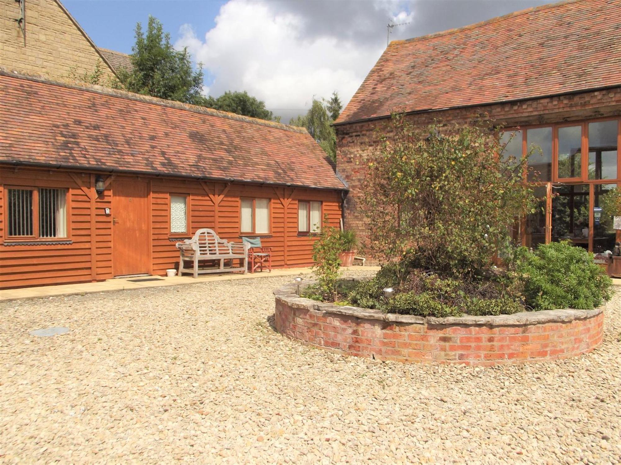 Bridge Farm Holiday Cottages カウ・ハニーボーン 部屋 写真