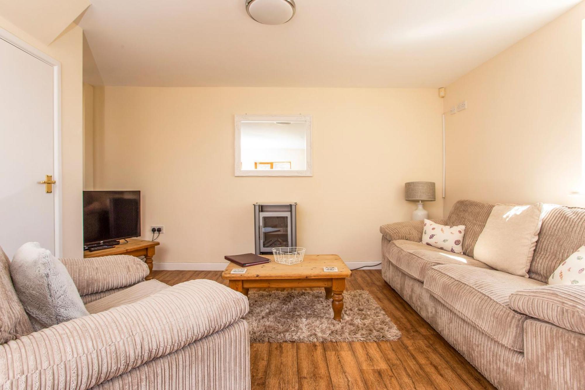Bridge Farm Holiday Cottages カウ・ハニーボーン 部屋 写真